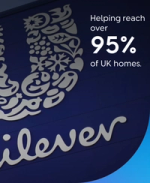 Unilever logo on blue wall with text “Helping reach over 95% of UK homes.