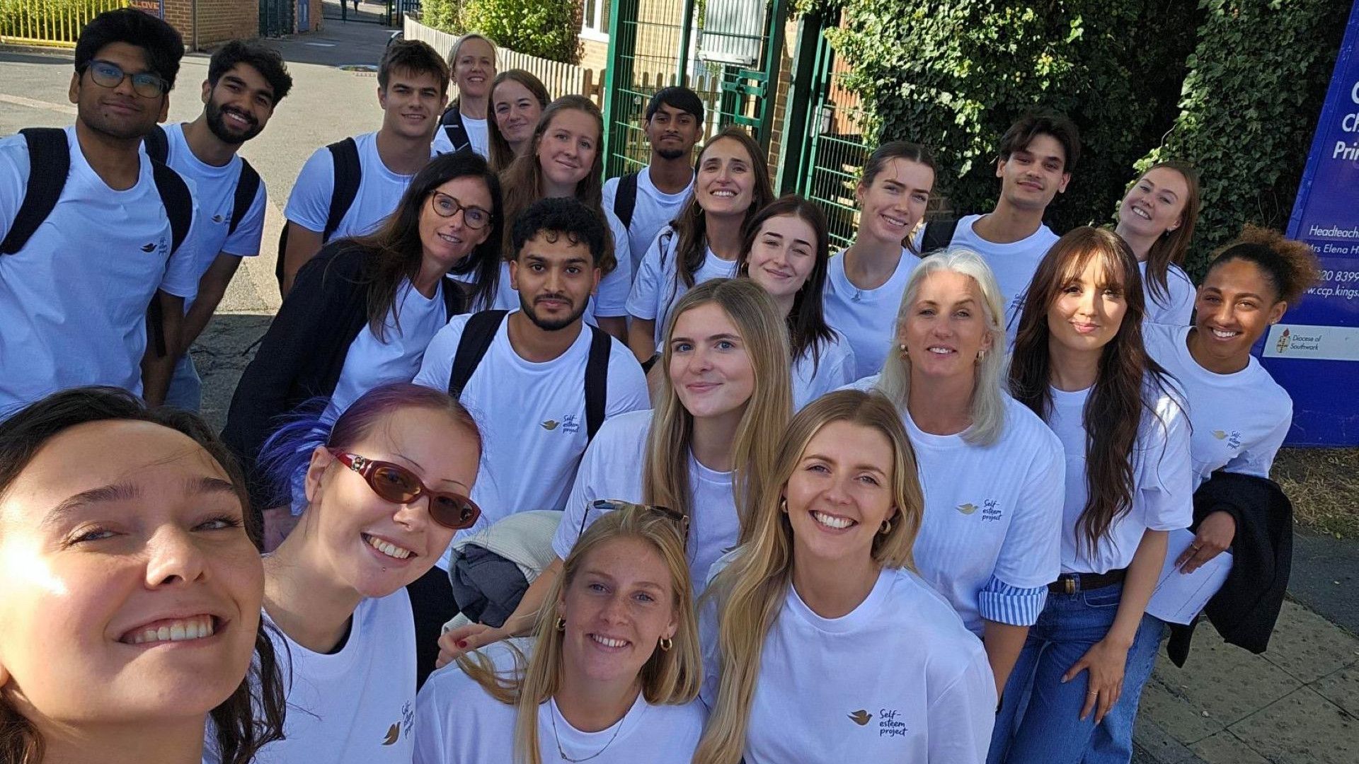 Group of Dove Day volunteers outside a school that took part in Dove Day.
