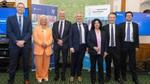 Seven representatives from Unilever, the University of Liverpool and partner organisations pose for a group photo at an event celebrating their research and innovation partnership.