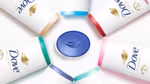 Photo of Dove’s MicroMoisture Body Wash range featuring five variants with different coloured lids, arranged in a circle.