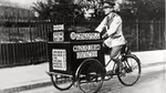 Black and white picture of a man on a Wall’s trike