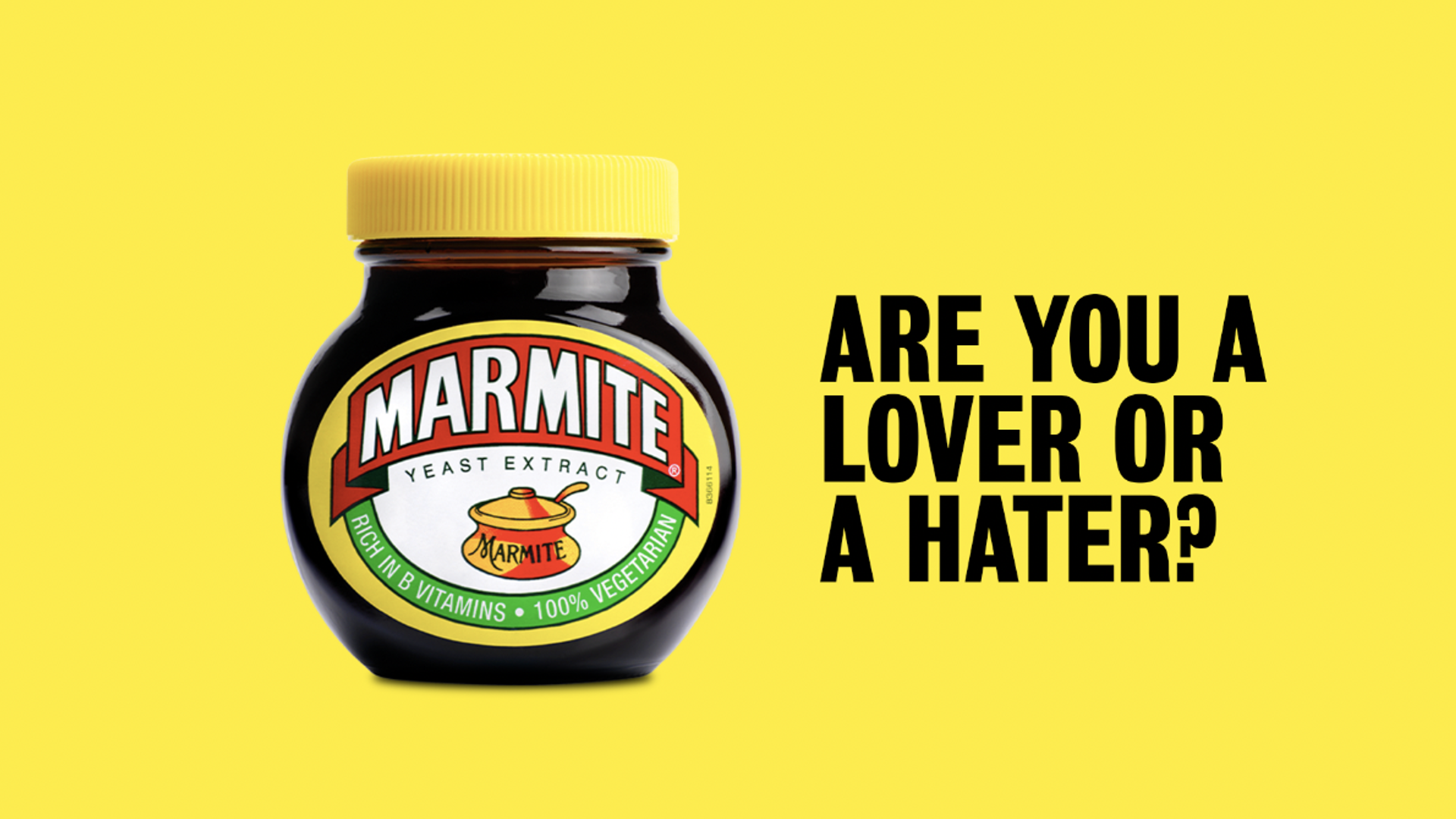A jar of marmite against a yellow background, with text to the side saying 'are you a lover or a hater?