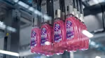 Bottles of Persil Wonder Wash on a factory production line.