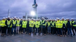 Teams stand at the top of the new Unilever Campus to celebrate topping out