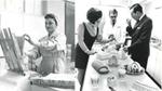 Black and white images of woman at ice cream factory and two men and woman tasting a selection of different ice creams