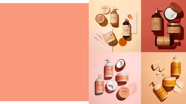A square divided into four segments, each with different Shea Moisture products in, against a pink background