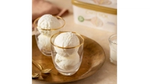 Vanilla ice cream in glassware.