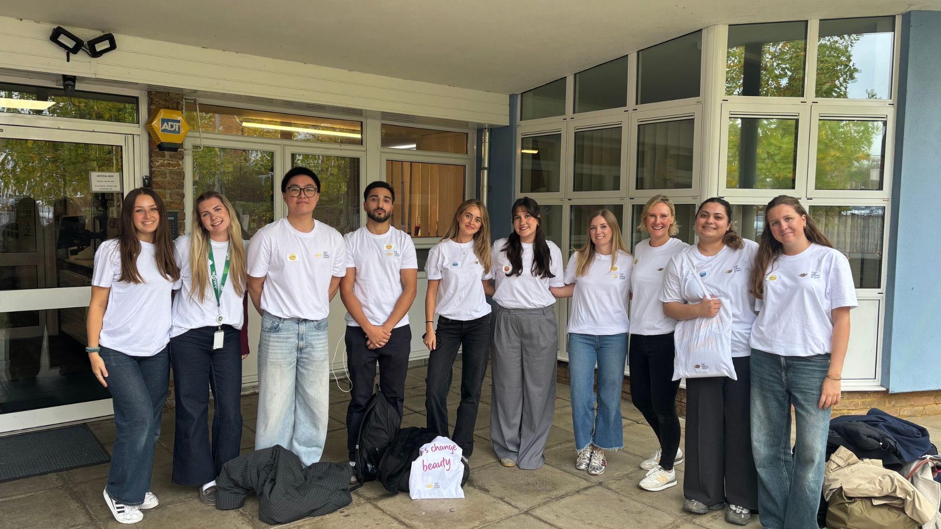 Group of Dove Day volunteers after delivering a workshop.
