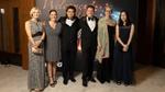 Richard standing with award nominees and award members
