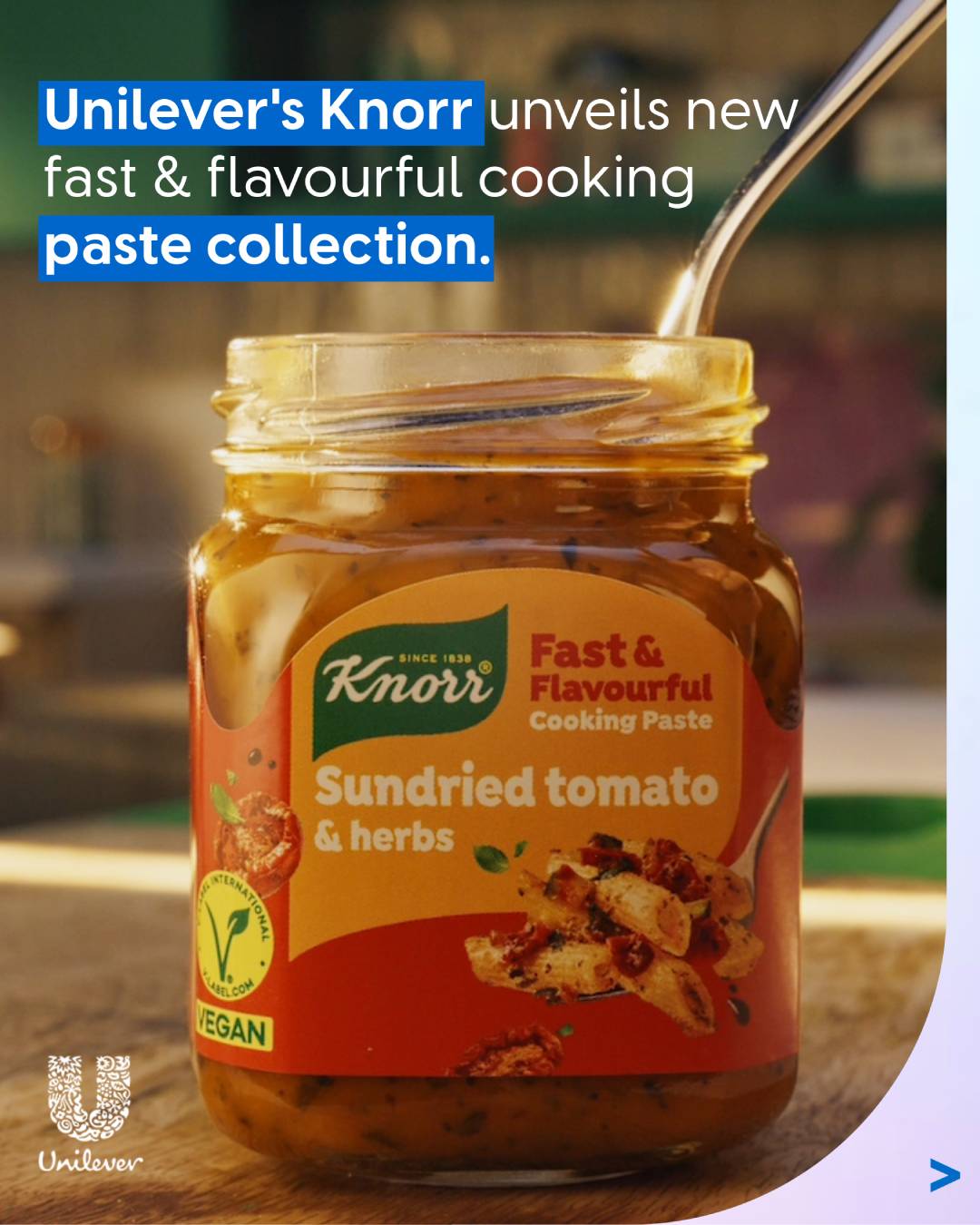 An electric vehicle charging station with delivery trucks in the background, and a text that says "Three impactful ways we're cutting our UK logistics emissions".