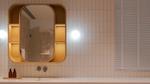 Modern bathroom vanity with a rounded mirror, illuminated shelves and white tiled walls