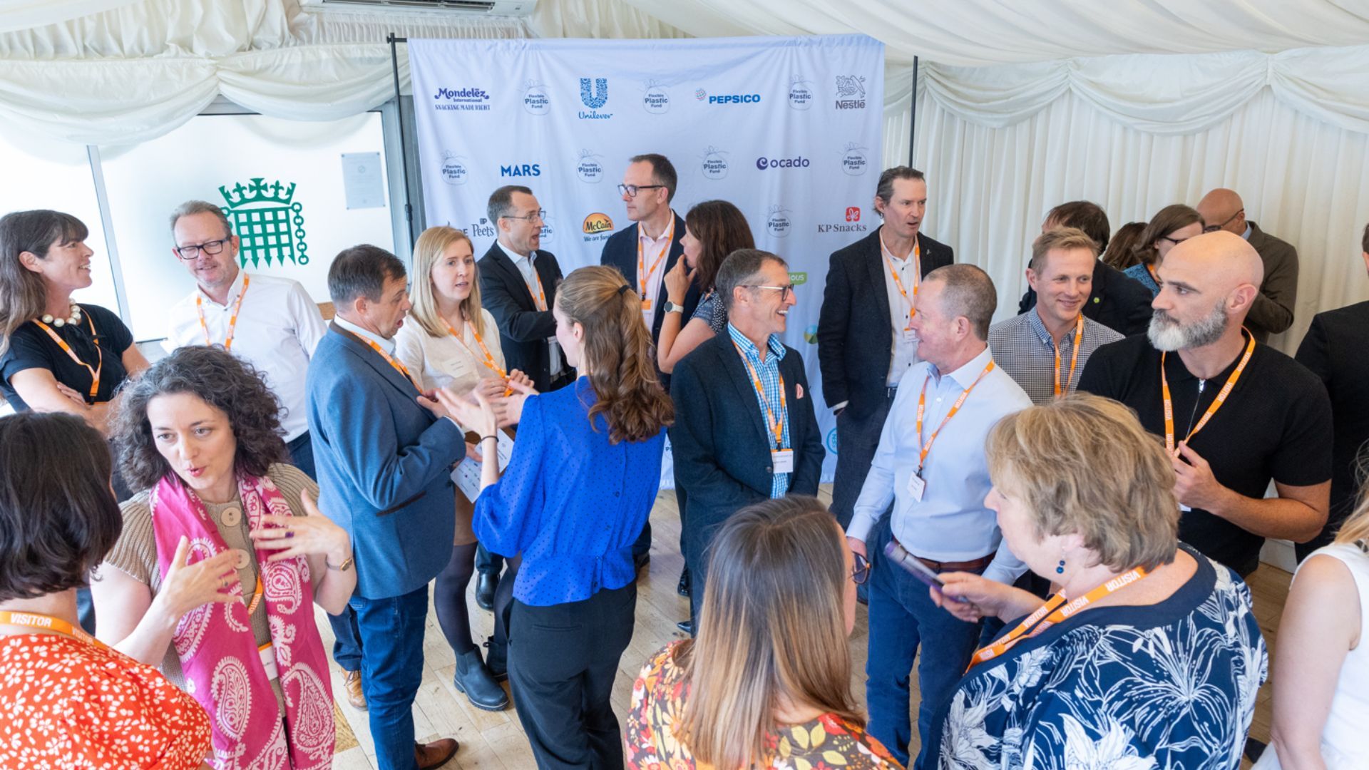 People talking at a reception