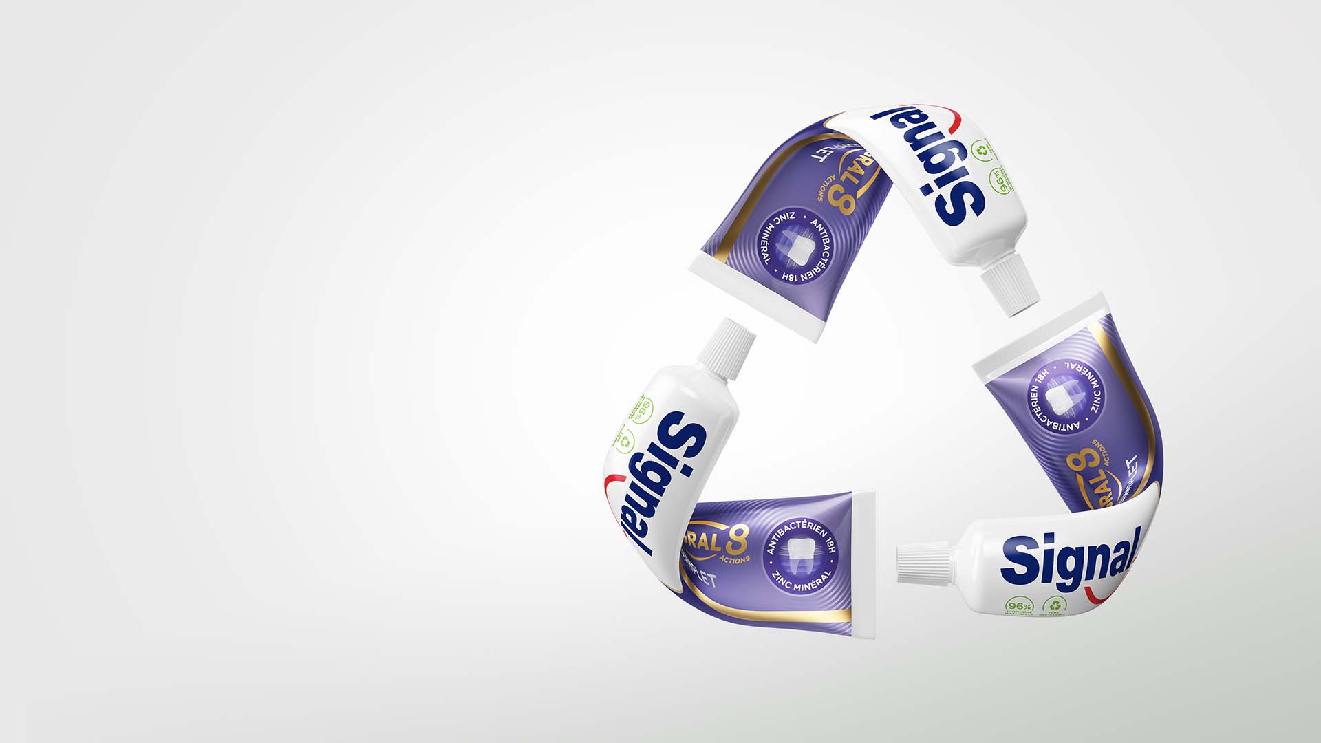 Three Signal toothpaste tubes forming shape of recycling logo. We’re shifting our oral care portfolio to recyclable tubes.
