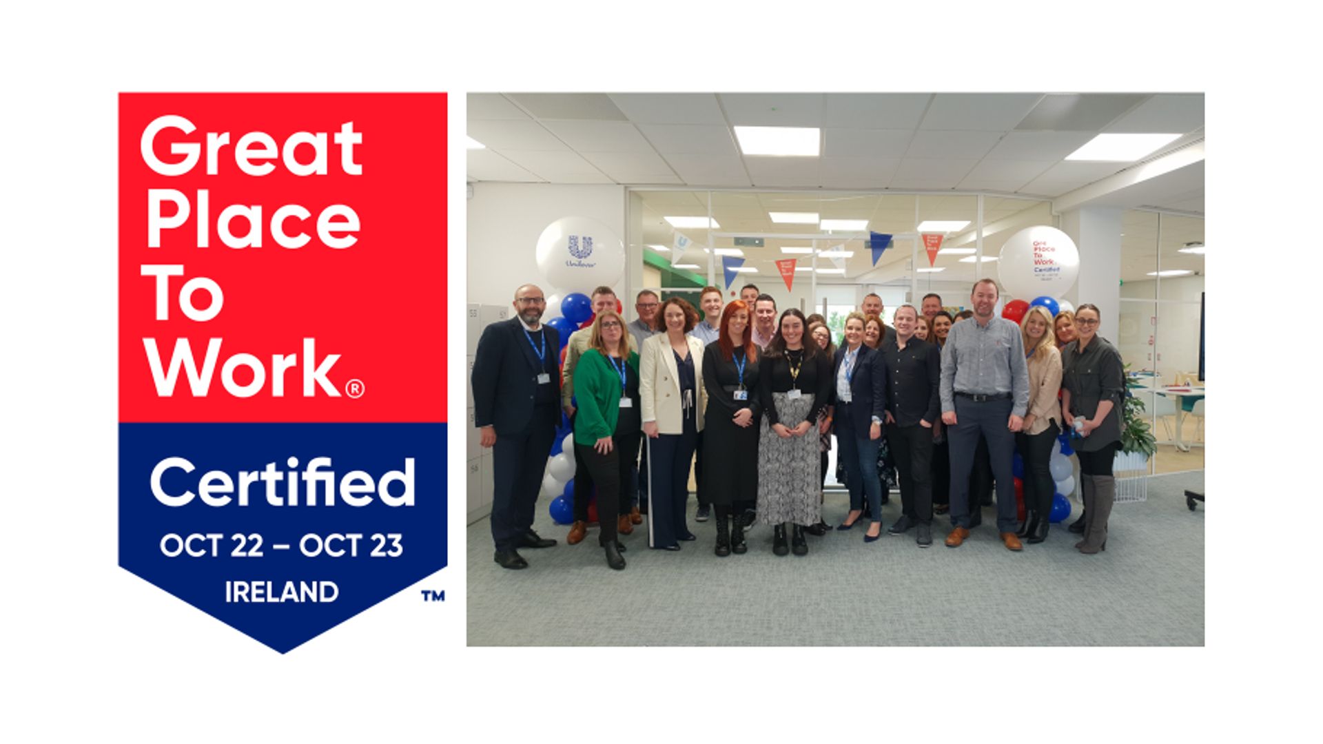 Great Place to World Certified Ireland, group of people in office smiling at camera 
