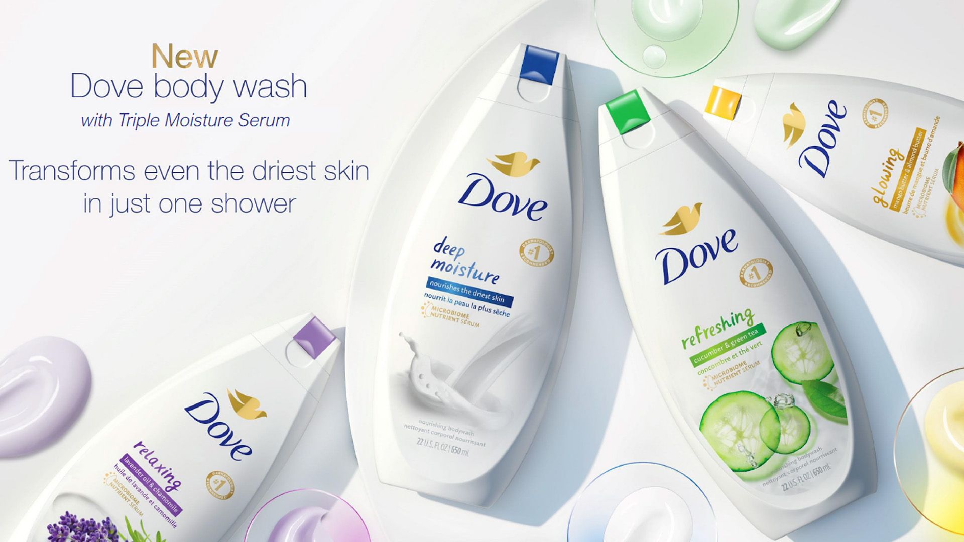 Advertising image showing four bottles in the new Dove Body Wash range.